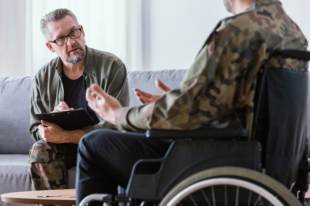 uniformed veteran attending a therapy session