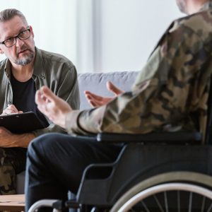 uniformed veteran attending a therapy session